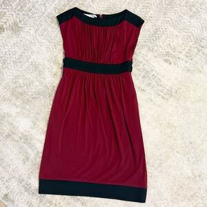 Maggie London stretch knit, dark red and black tie dress with pockets. Size 4.